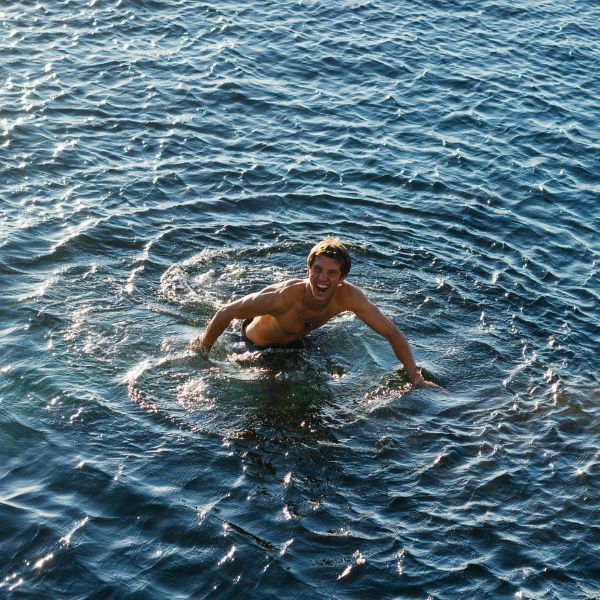 Man laughing in water