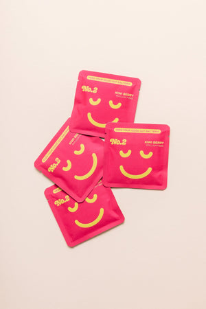 No2 product image multiple 8g travel pouches arranged on a flat table
